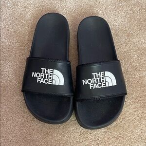 The North Face Black Slides with White Logo